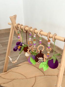 Тренажер Монтессорі, baby gym &laquo;Фіолетовий&raquo; 17 фото