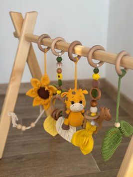 Тренажер Монтессорі, baby gym &laquo;Сонячний жирафик&raquo; 17 фото